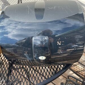 Black towel dispenser new in box .